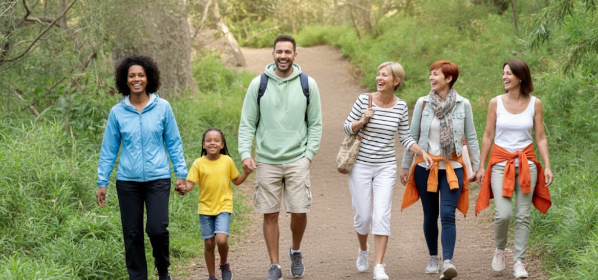 Group walking through ancient woodland in the Forest of Dean