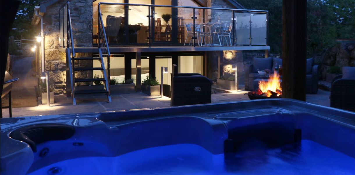 Hot tub at a large group cottage in Gloucestershire